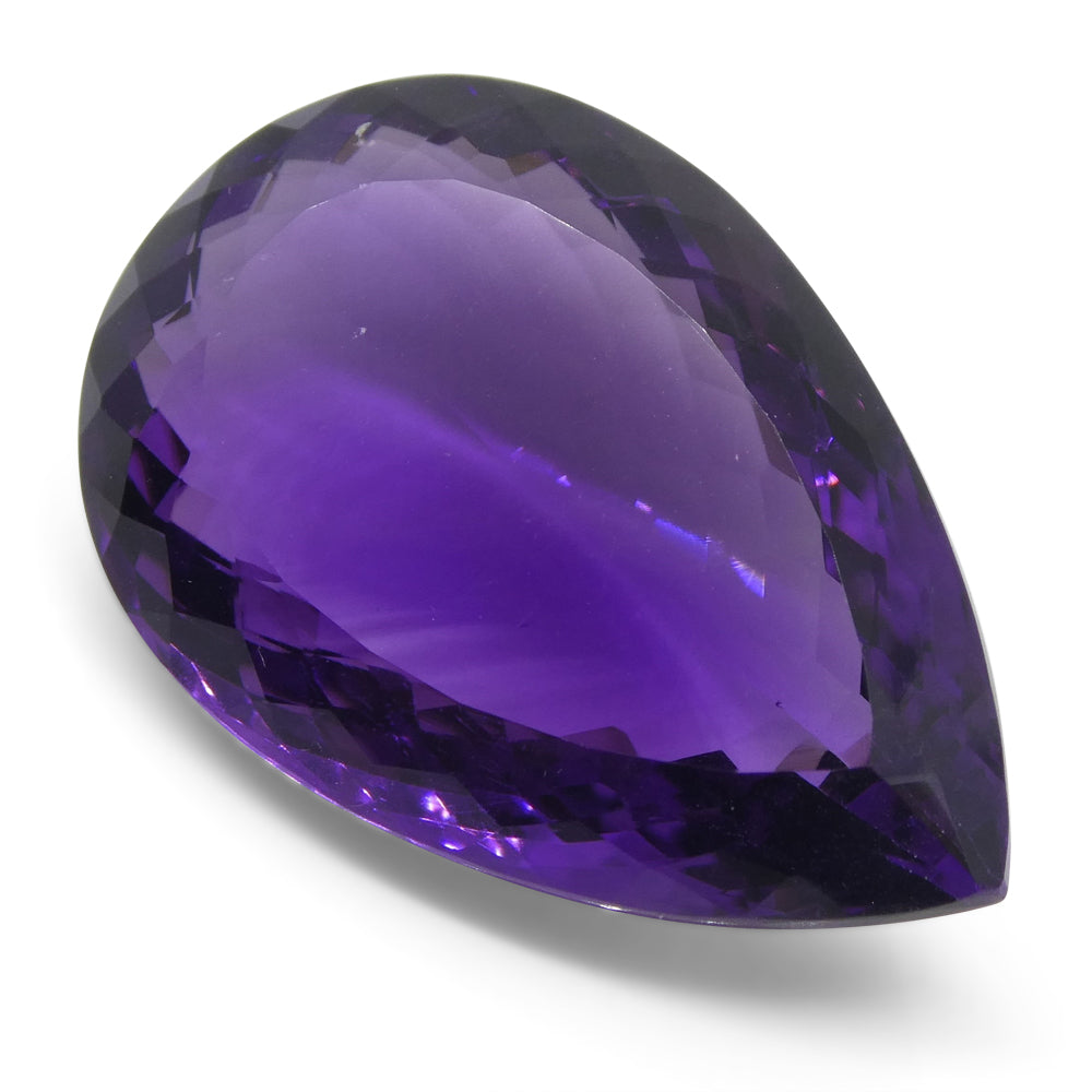 Large 34.19ct Bolivian Purple Amethyst Pear Cut Gemstone from SkyJems Canadian Gem Specialists