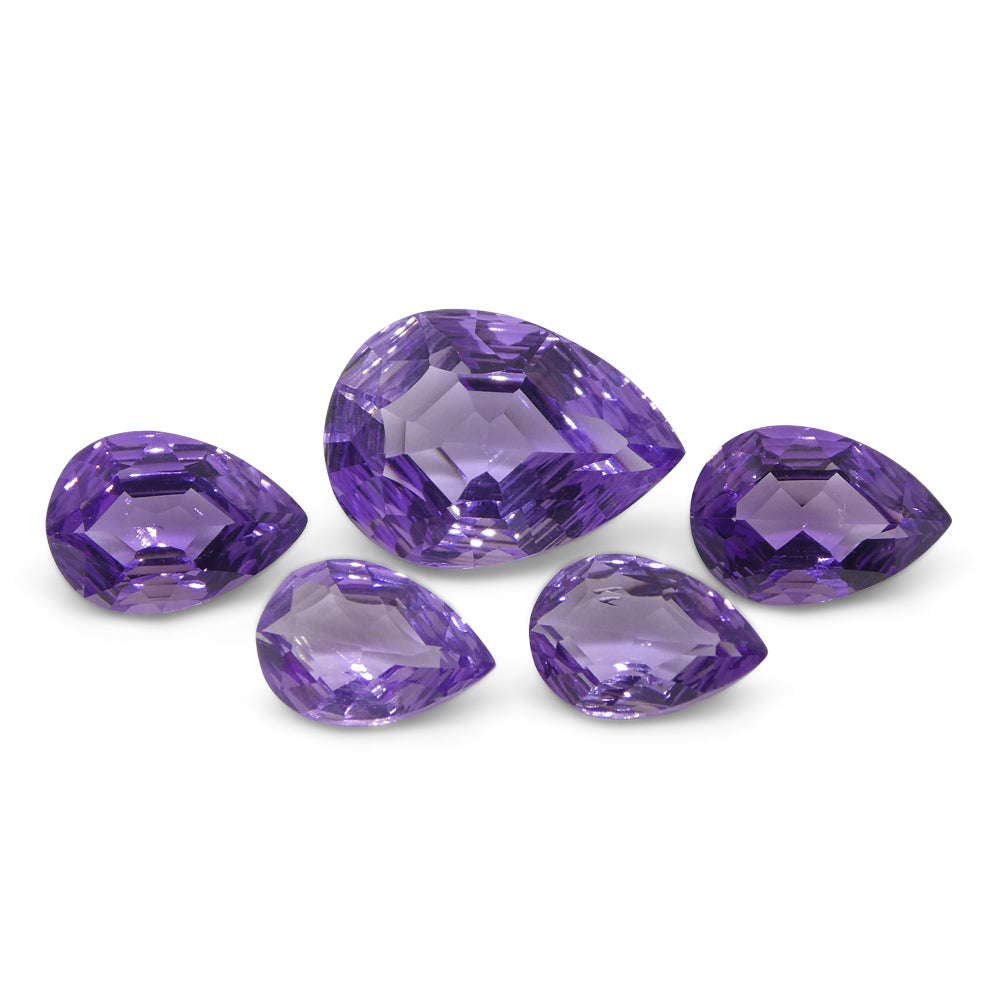 Amethyst 11 cts 1x 14.00x10.00mm, 2x 10.00x7.00mm, 2x 9.00x6.00mm Pear Purple  $350