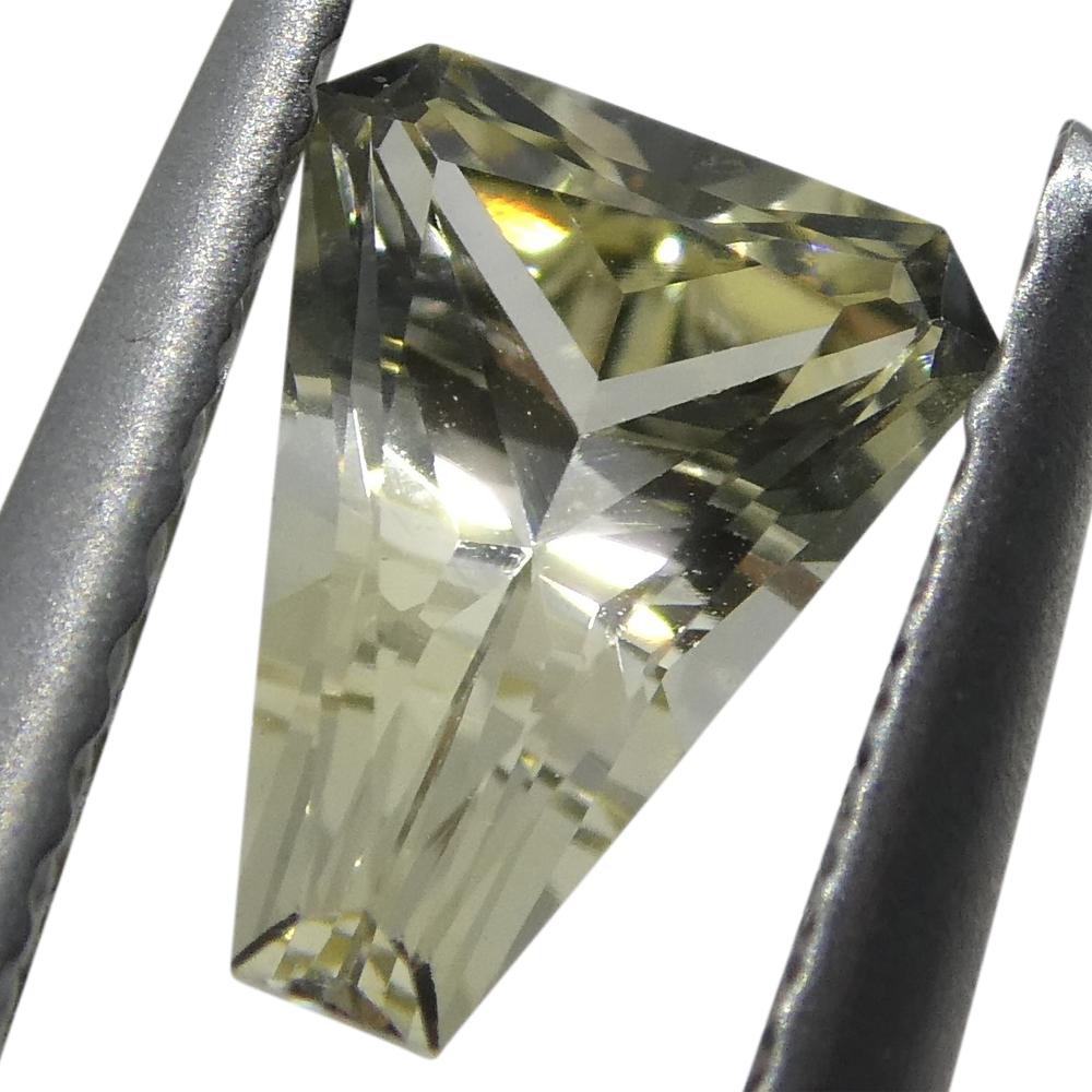 0.85ct Yellow Sapphire Cut Corner Trillion from Sri Lanka, transparent mixed-cut gem by SkyJems Canadian gemstone experts