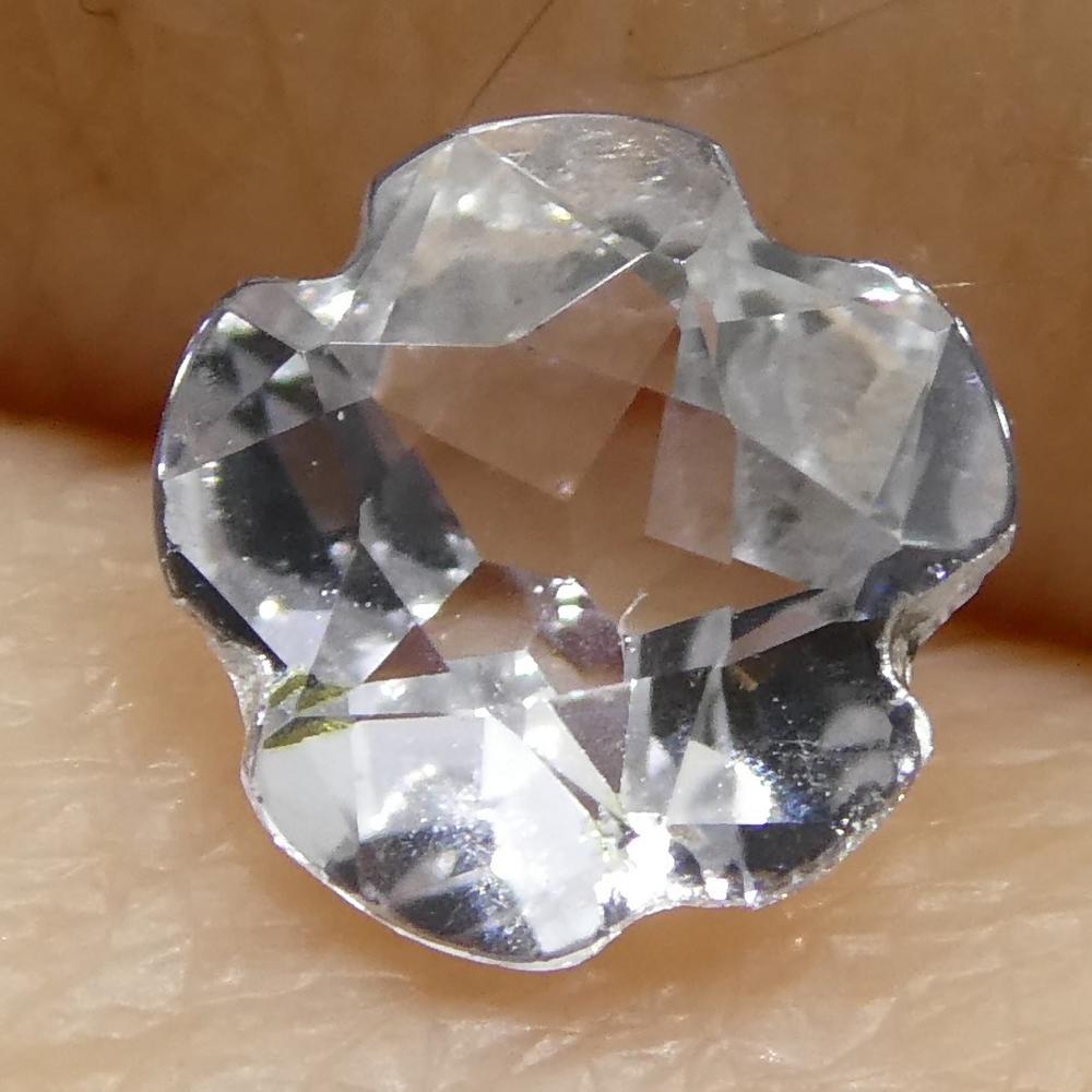 0.57ct White Sapphire Flower from Sri Lanka, cushion mixed cut gemstone by SkyJems Canadian gem specialists