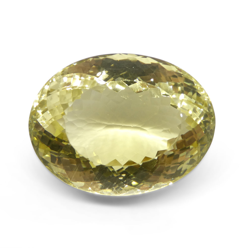 Citrine 124.52 cts 36.00 x 27.20 x 20.35 Oval Very Slightly Greenish Yellow  $250