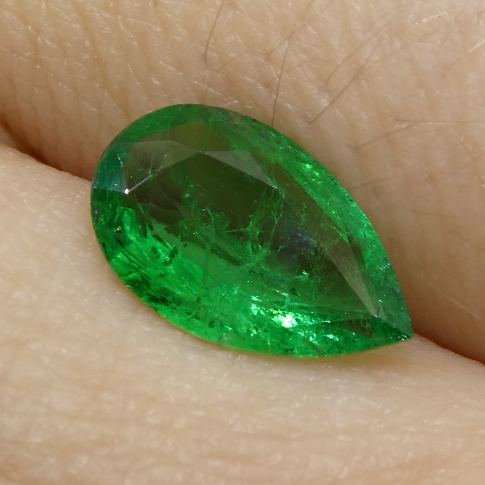1.02ct Pear-Cut Green Zambian Emerald from SkyJems, premium medium-dark beryl gemstone with exceptional clarity and color