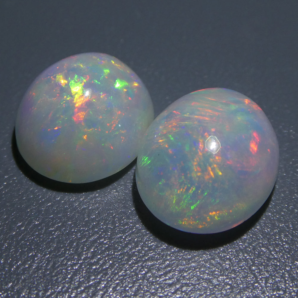SkyJems 7.14ct Ethiopian Crystal Opal Pair: Vibrant Oval Cabochon Gemstones with Multicolor Play of Colour