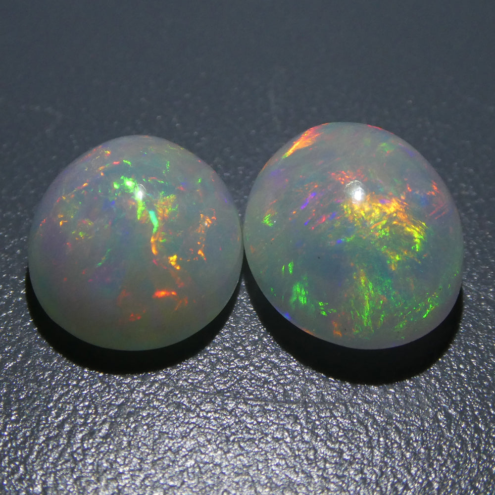 SkyJems 7.14ct Ethiopian Crystal Opal Pair: Vibrant Oval Cabochon Gemstones with Multicolor Play of Colour