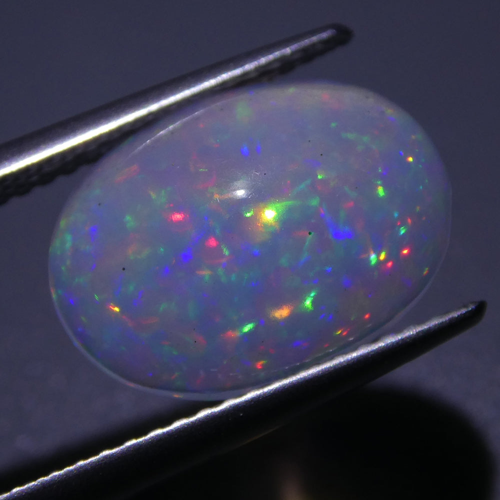 3.01ct Ethiopian Crystal Opal with Vibrant Play of Colour, Oval Cabochon Cut - Premium Gemstone by SkyJems Canada