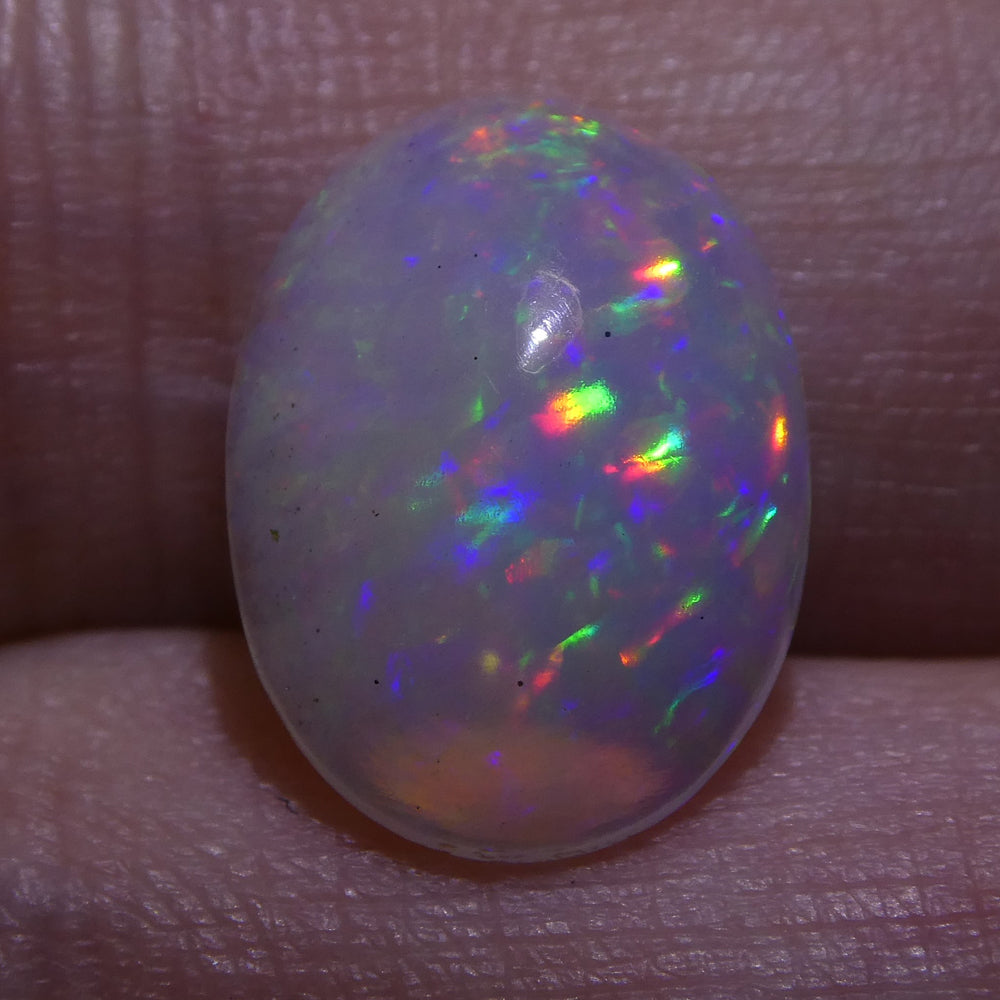 3.01ct Ethiopian Crystal Opal with Vibrant Play of Colour, Oval Cabochon Cut - Premium Gemstone by SkyJems Canada