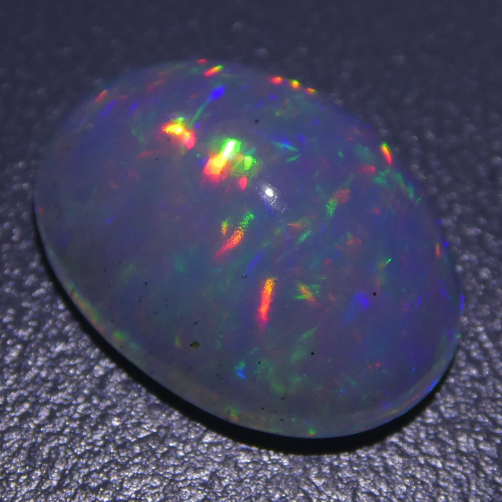 3.01ct Ethiopian Crystal Opal with Vibrant Play of Colour, Oval Cabochon - Premium Gemstone by SkyJems Canada