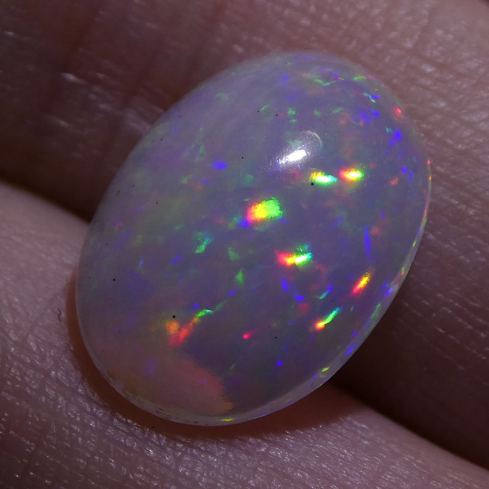 3.01ct Ethiopian Crystal Opal with Vibrant Play of Colour, Oval Cabochon Cut - Premium Gemstone by SkyJems Canada