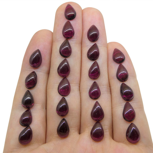 40ct Pyrope-Almandine Pear Cabochon Purple Rhodolite Garnet from Mozambique Wholesale Lot - Skyjems Wholesale Gemstones