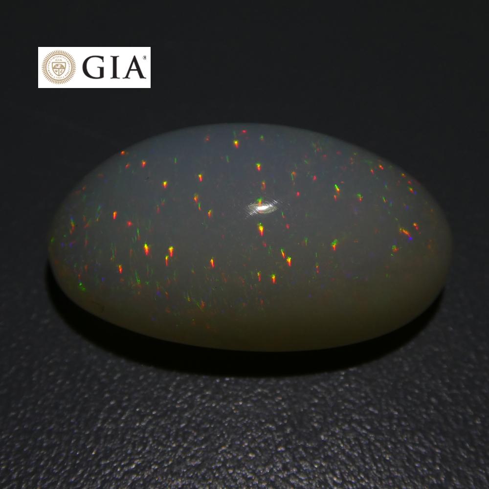 15.54 ct Ethiopian Oval White Opal with Vibrant Play of Color, GIA Certified Natural Gemstone by SkyJems