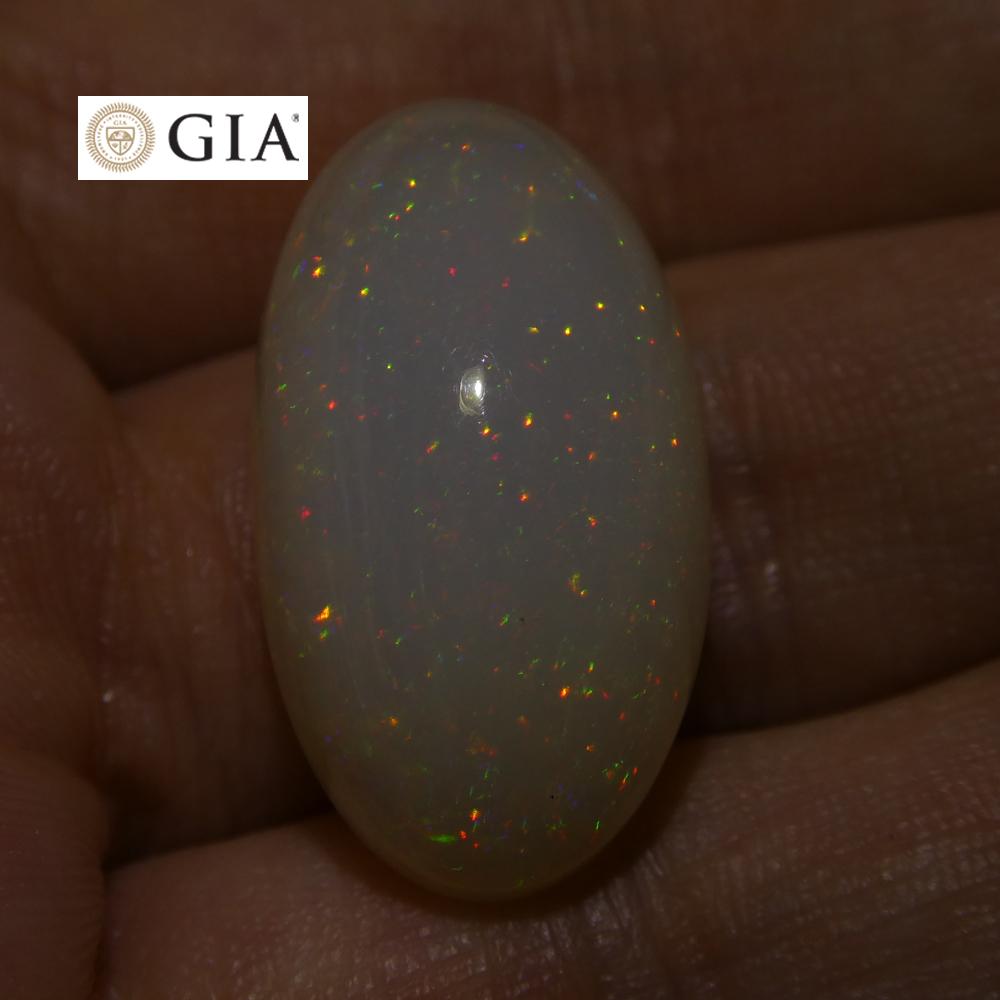 15.54 ct Ethiopian Opal with Vibrant Play of Color, Oval White Gemstone, GIA Certified by SkyJems