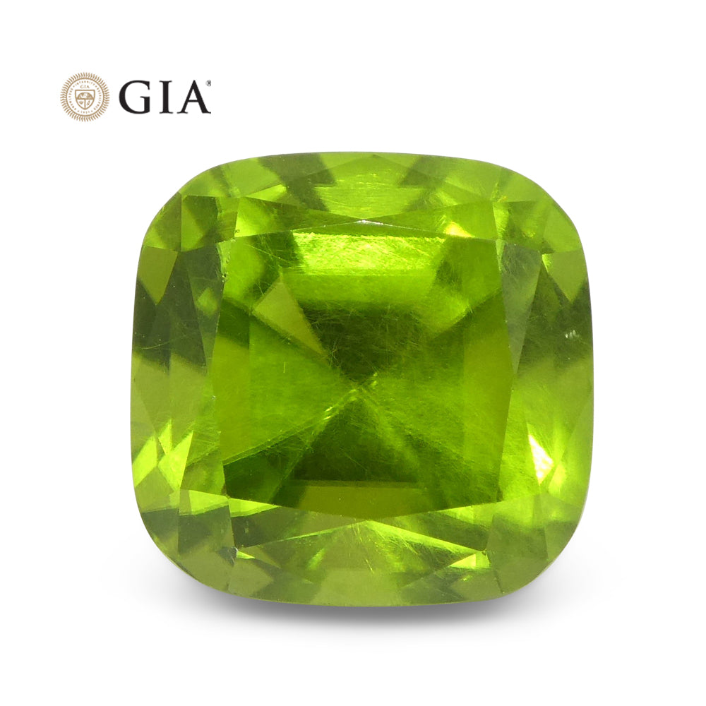 Peridot 10.5 cts 11.65 x 11.46 x 9.98 mm Cushion Yellowish Green  $6300