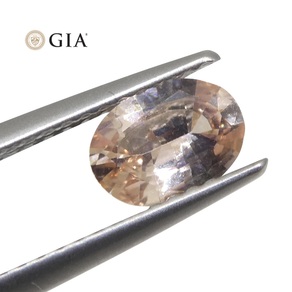 0.77ct Oval Padparadscha Sapphire from East Africa, Orangy Pink Natural Gemstone by SkyJems