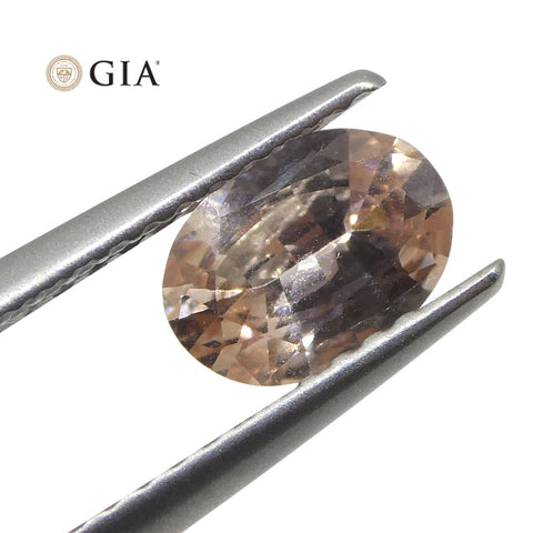 0.77ct Oval Orangy Pink Padparadscha Sapphire GIA Certified East Africa