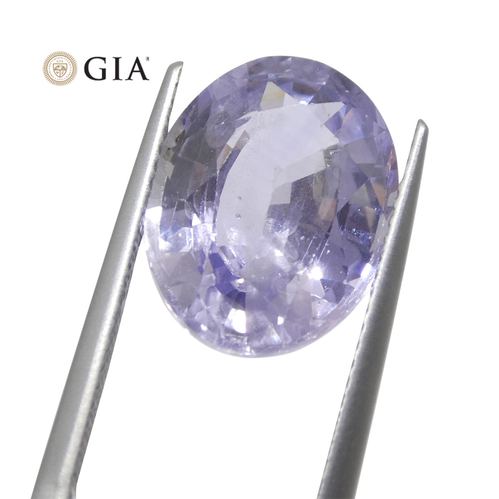 Sapphire 9.37 cts 14.52 x 11.11 x 6.59 mm Oval Violet changing to Pinkish Purple  $22000