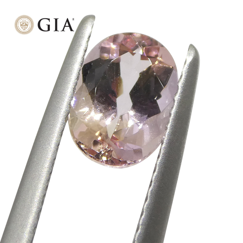 1.35ct Oval Orangy Pink Topaz GIA Certified - Skyjems Wholesale Gemstones