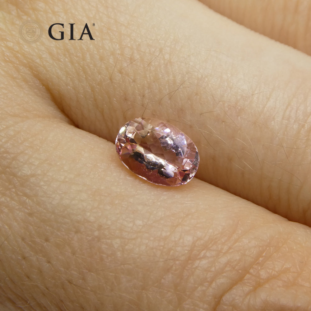 1.35ct Oval Orangy Pink Topaz GIA Certified - Skyjems Wholesale Gemstones