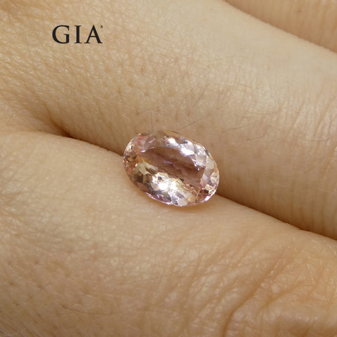 1.5ct Oval Orange-Pink Topaz GIA Certified