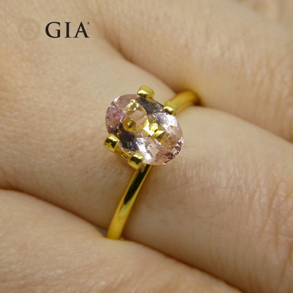 1.5ct Oval Brazilian Orange-Pink Imperial Topaz, GIA Certified Gemstone from SkyJems' Rare Colored Stone Collection
