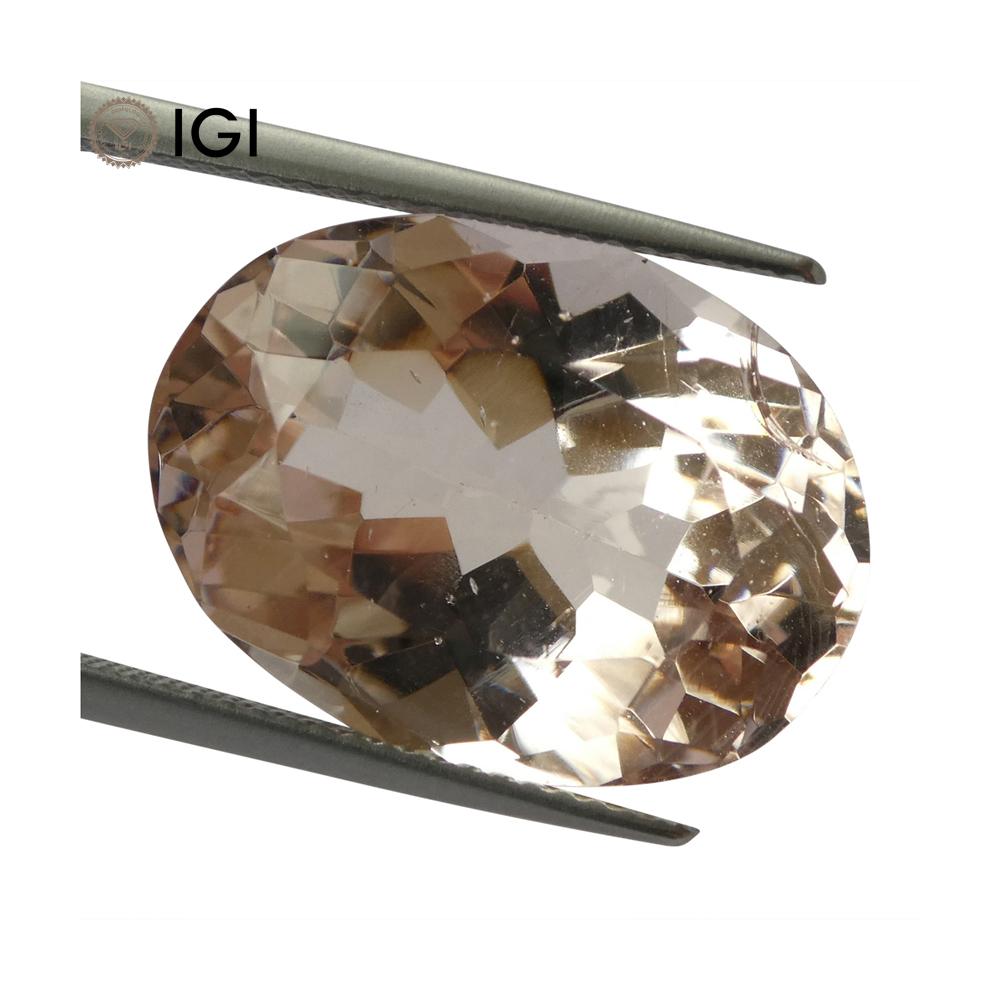 14.41 ct Orangy Pink Morganite Oval Gemstone, IGI Certified Canadian Fine Gem from SkyJems