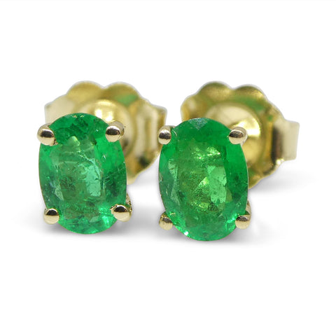 0.6ct Oval Green Emerald Stud Earrings set in 14k Yellow Gold