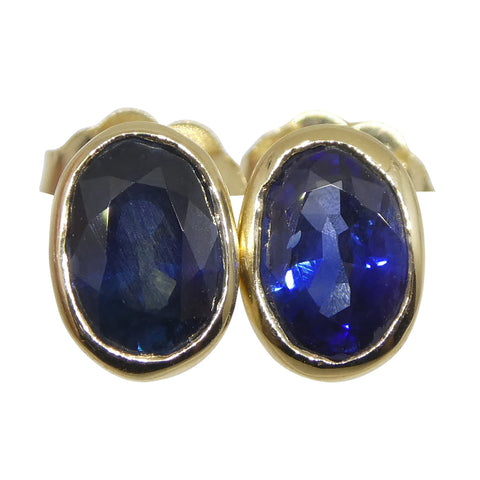 1.38ct Oval Blue Sapphire Stud Earrings set in 14k Yellow Gold