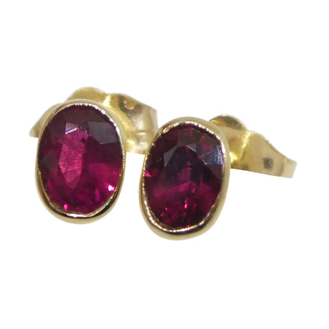 0.42ct Oval Red Ruby Stud Earrings set in 14k Yellow Gold
