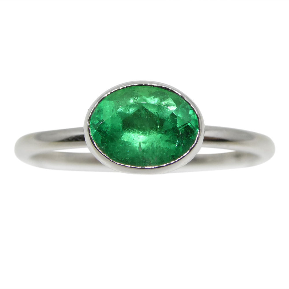 Dainty Colombian emerald oval stacker ring in 10kt white gold, handcrafted by SkyJems Canadian jewellers since 1967