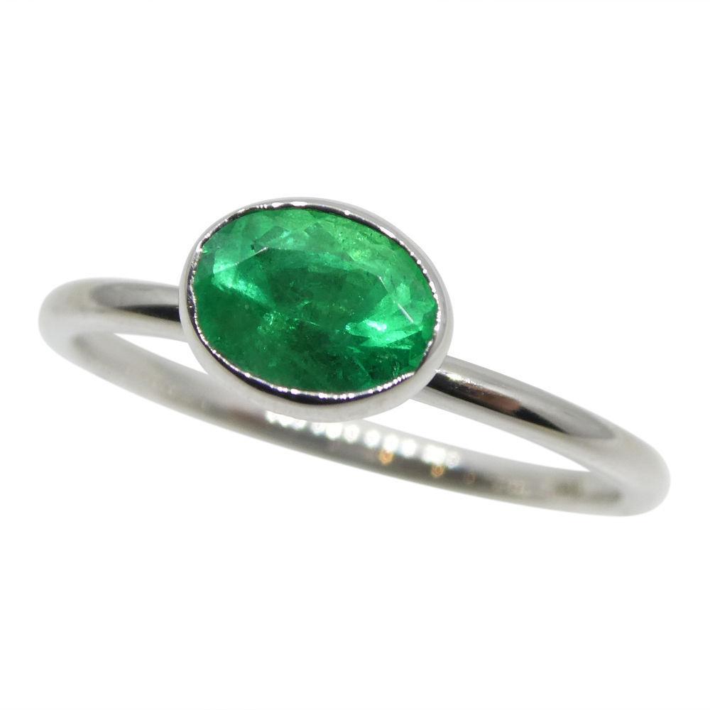 Dainty Colombian emerald stacker ring in 10kt white gold, oval green gemstone solitaire by SkyJems Canada