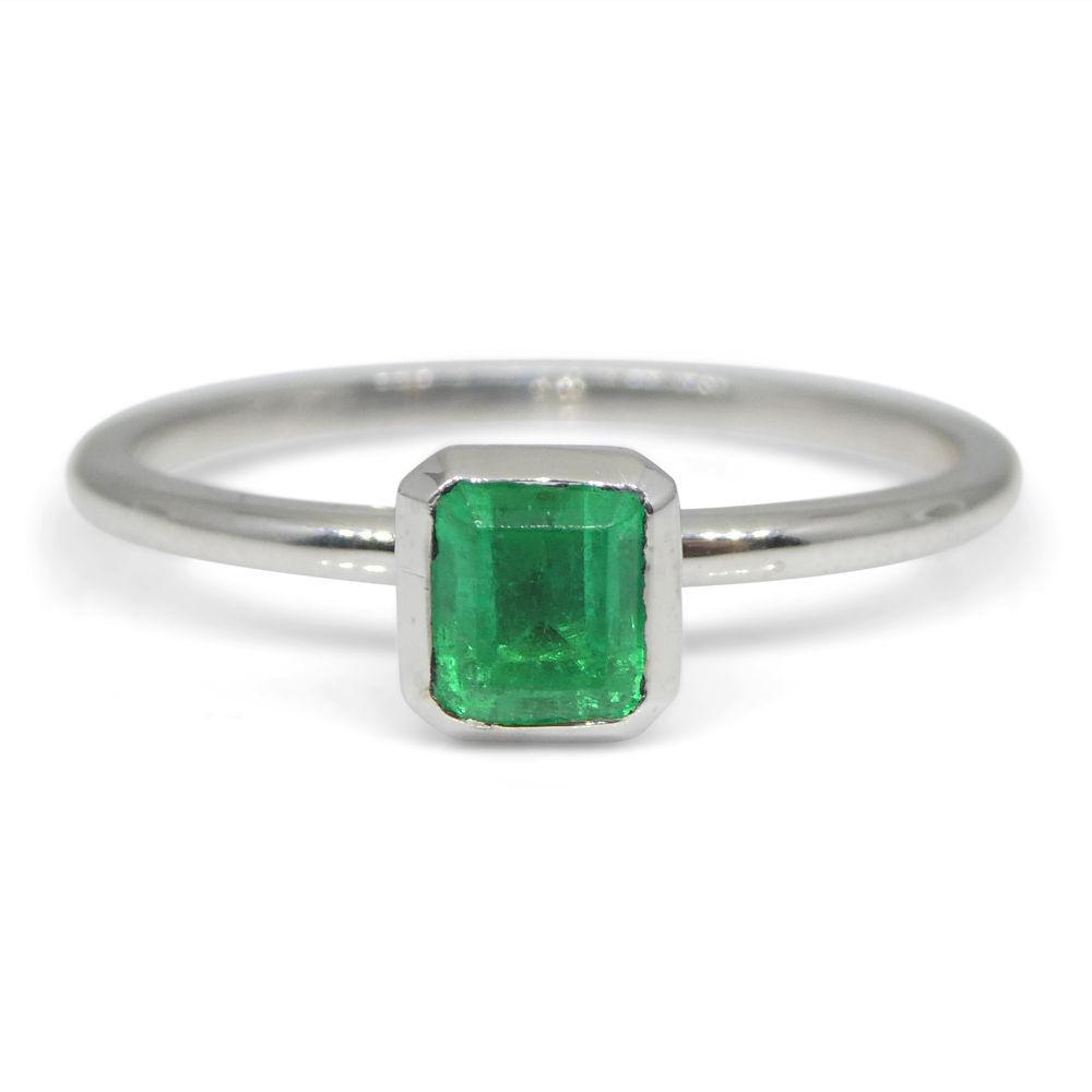 Dainty Colombian emerald octagon-cut stacker ring in 10kt white gold, handcrafted by SkyJems Canadian jewellers