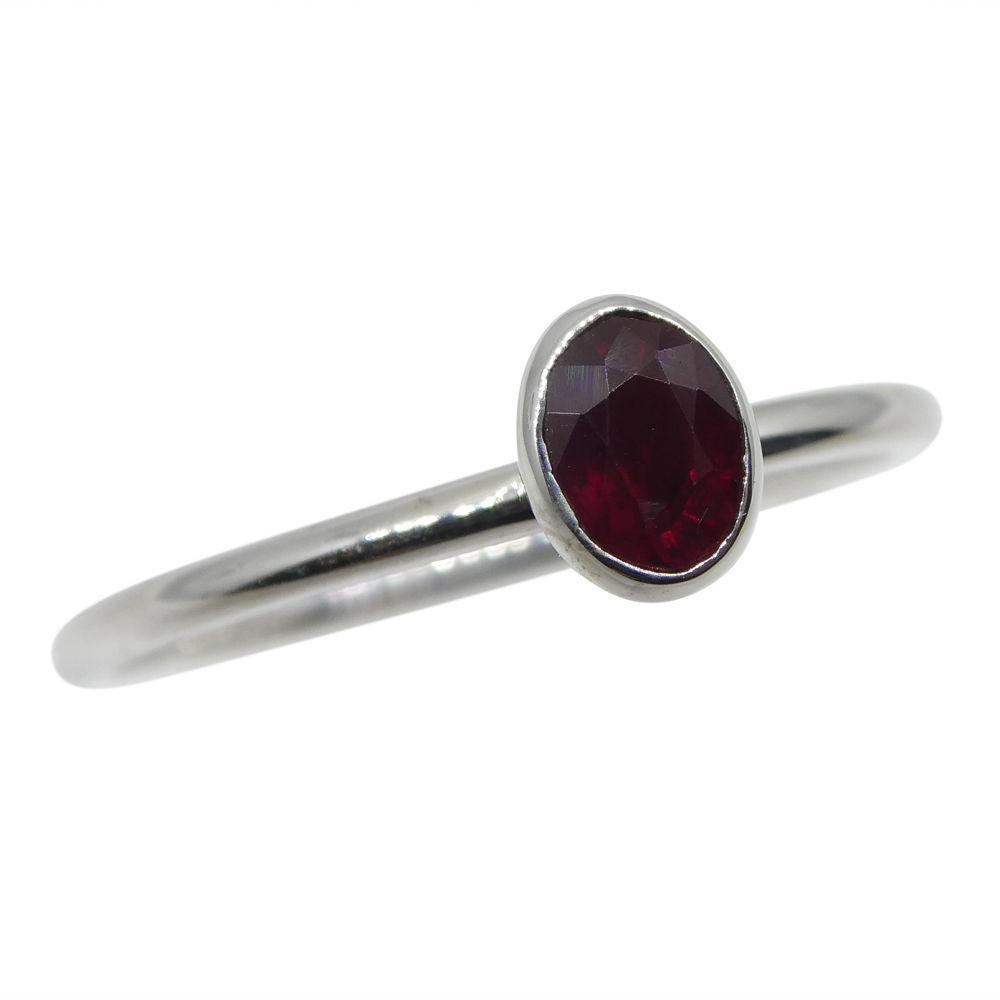 Dainty oval ruby stacker ring in 10kt white gold, Myanmar origin, handcrafted by SkyJems Canadian jewellers