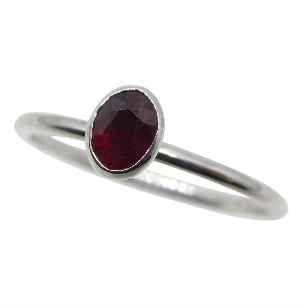 Dainty oval ruby stacker ring in 10kt white gold, Myanmar origin, handcrafted by SkyJems Canadian jewellers