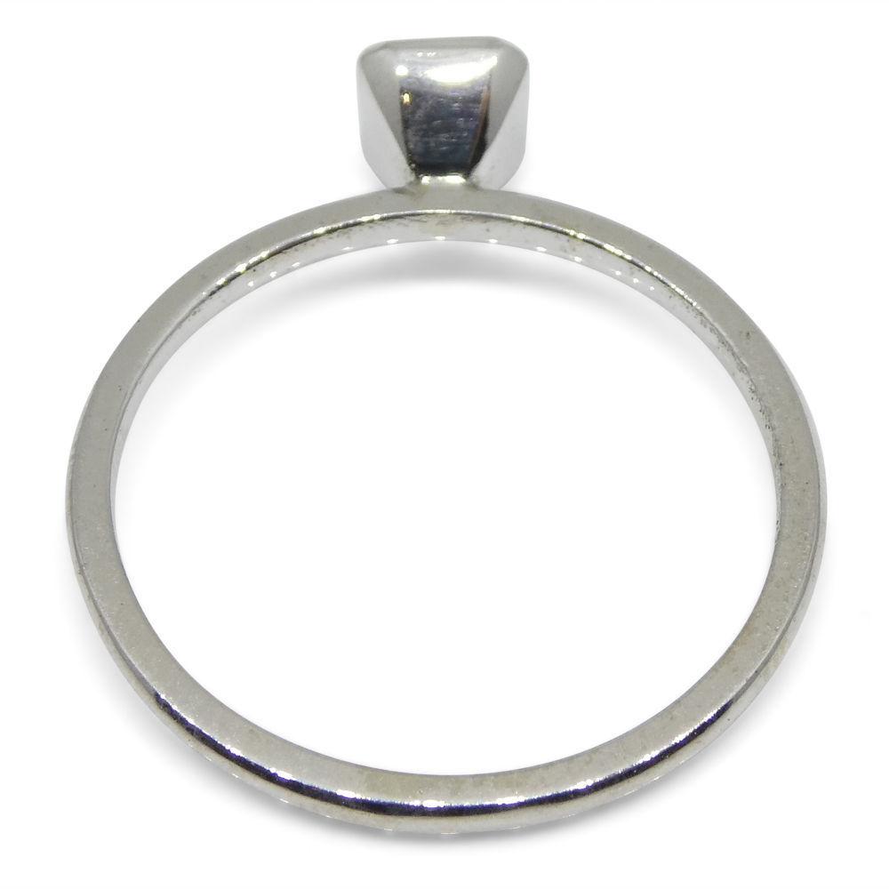 Dainty Colombian emerald stacker ring in 10kt white gold, octagon-cut green gemstone by SkyJems Canadian jewellers