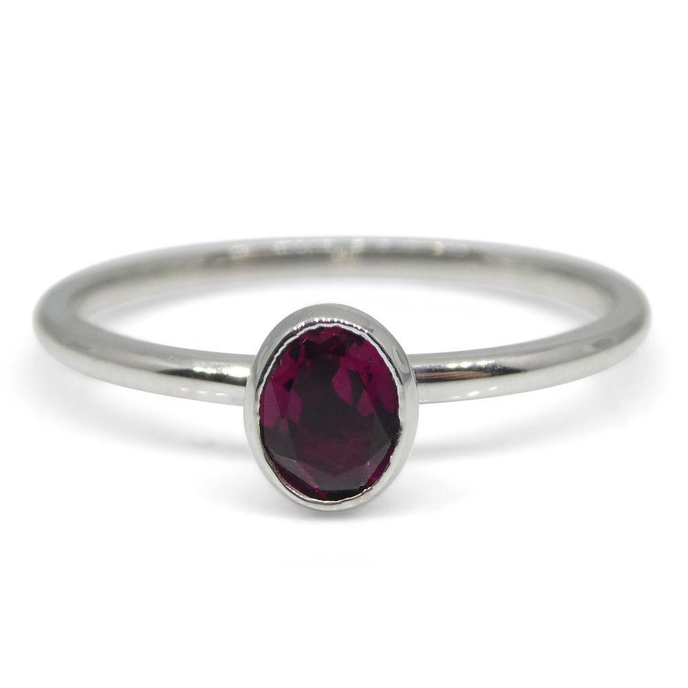 Dainty red tourmaline stacker ring in 10kt white gold, handcrafted by SkyJems Canadian jewellers, elegant oval solitaire desi