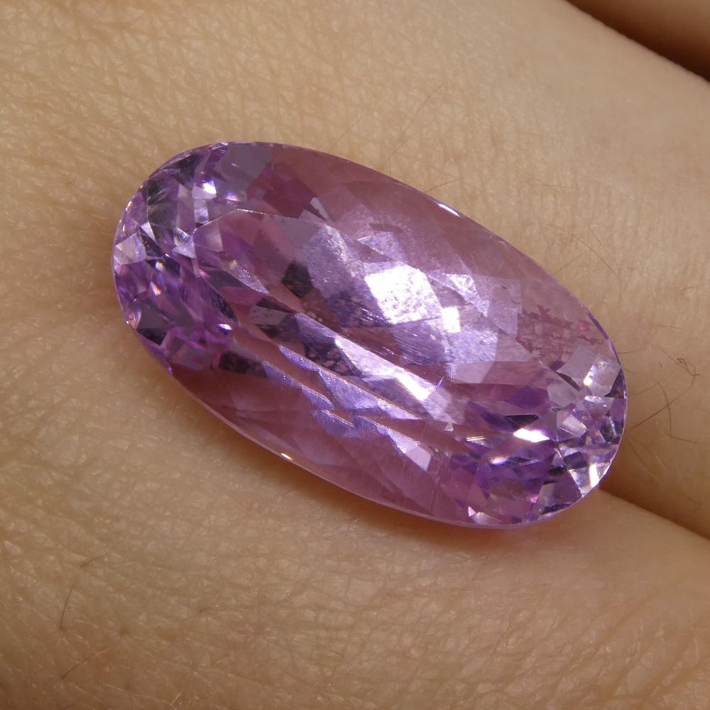 15.98 ct Slightly Purplish Pink Kunzite from Afghanistan, oval mixed cut gemstone by SkyJems Canadian gem specialists
