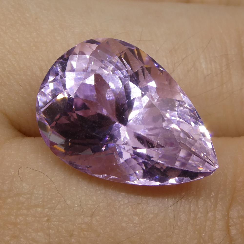 16.7 ct Purplish Pink Kunzite from Afghanistan, pear-cut gemstone by SkyJems, premium Canadian colored stone specialists
