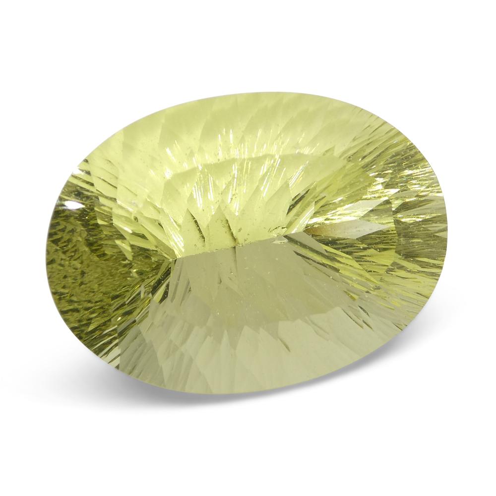 59.78ct Brazilian Lemon Citrine Oval Fantasy Cut, vibrant yellow gemstone from SkyJems' premium loose stone collection