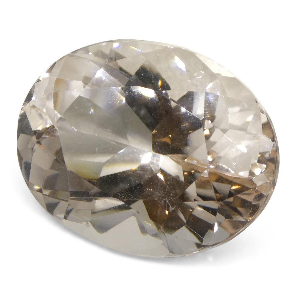 13.69 ct Brazilian Oval Morganite, soft pink to orange gemstone from SkyJems' premium loose stone collection