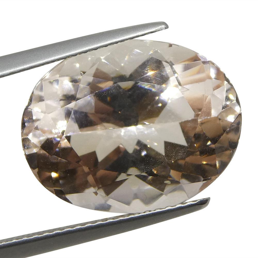 13.69 ct Brazilian Oval Morganite, soft pink-orange beryl gemstone from SkyJems' premium loose stone collection