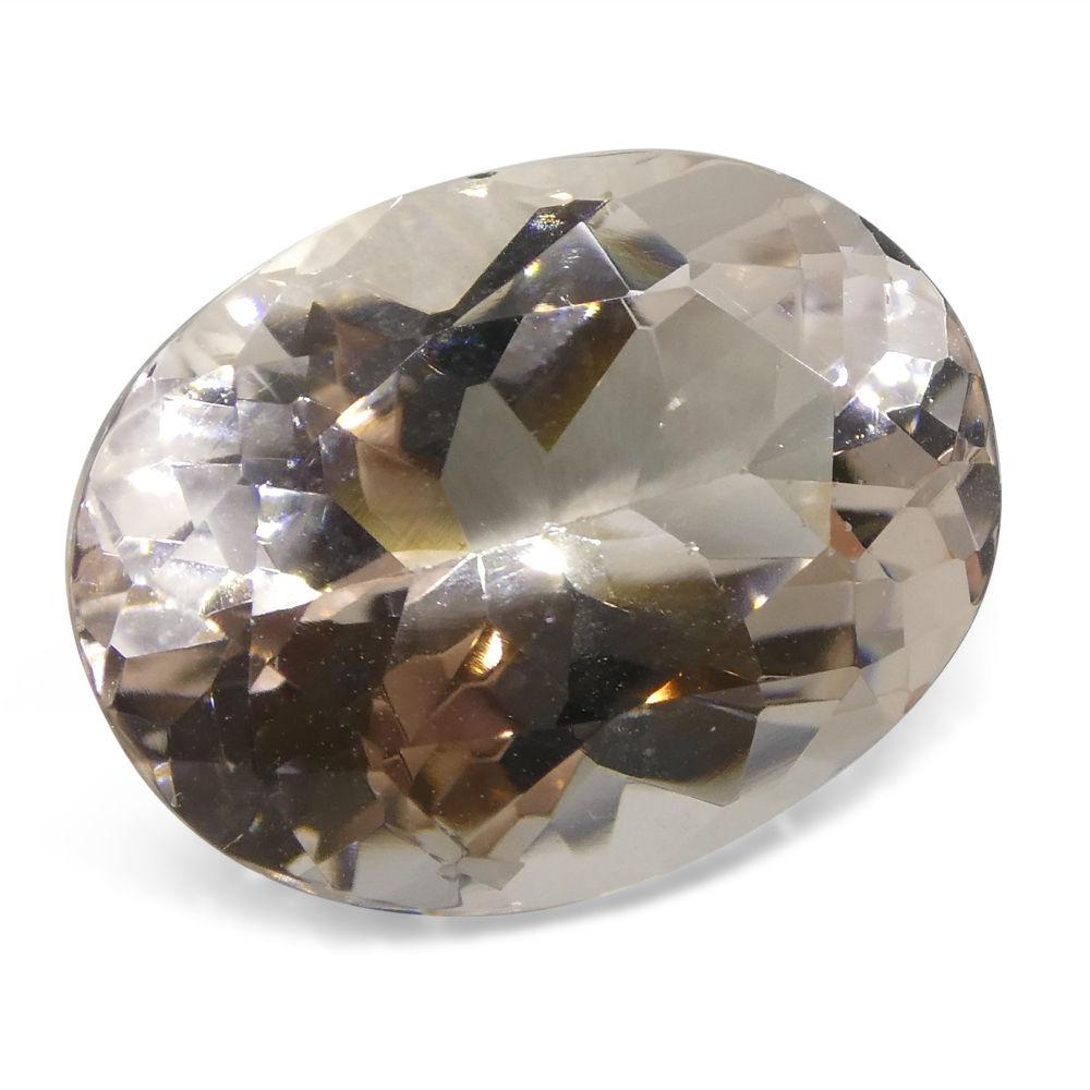 7.46 ct Brazilian Oval Morganite, soft pink-orange beryl gemstone from SkyJems' premium loose stone collection
