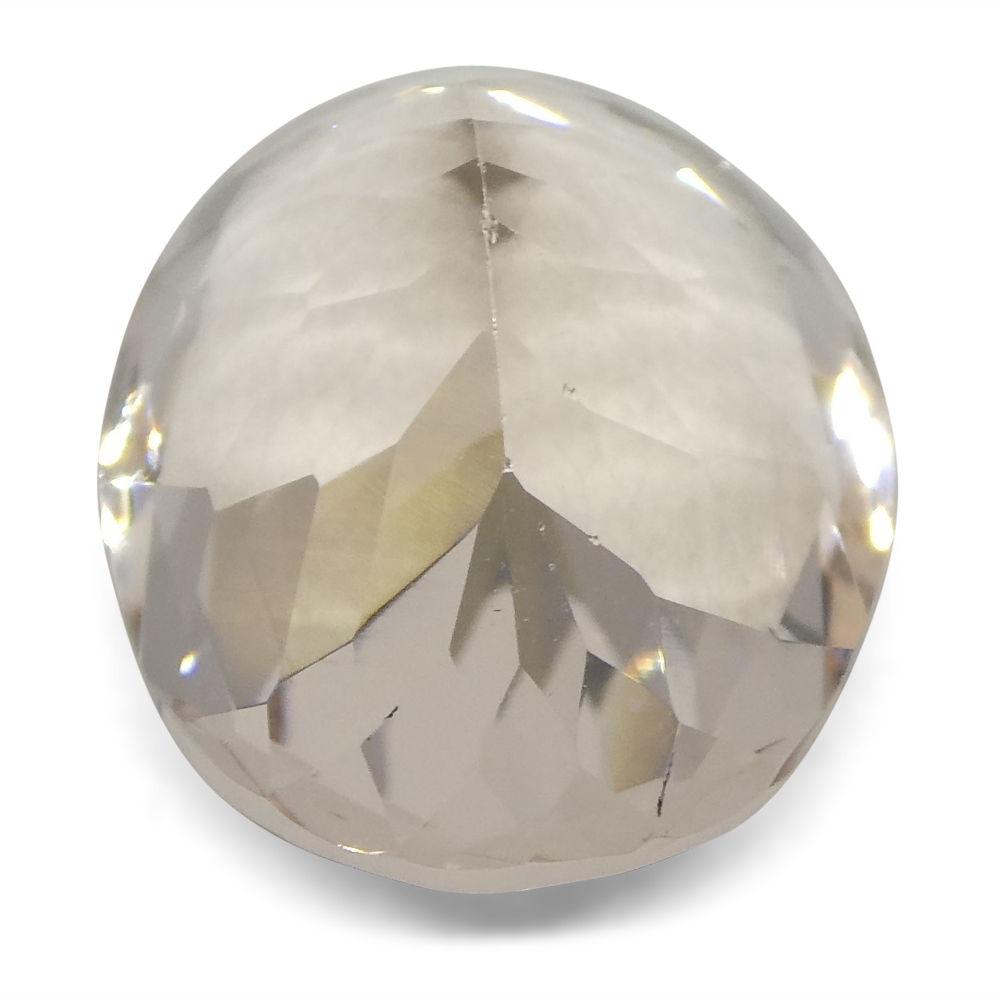 7.46 ct Brazilian Oval Morganite, soft pink-orange beryl gemstone from SkyJems' premium loose stone collection