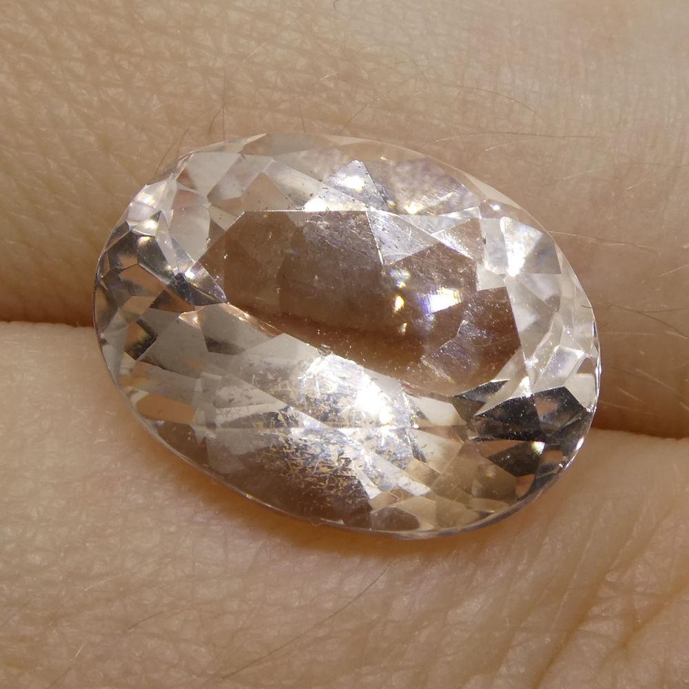 SkyJems 7.46 ct Brazilian Oval Morganite, soft pink-orange beryl gemstone with brilliant cut and exceptional clarity