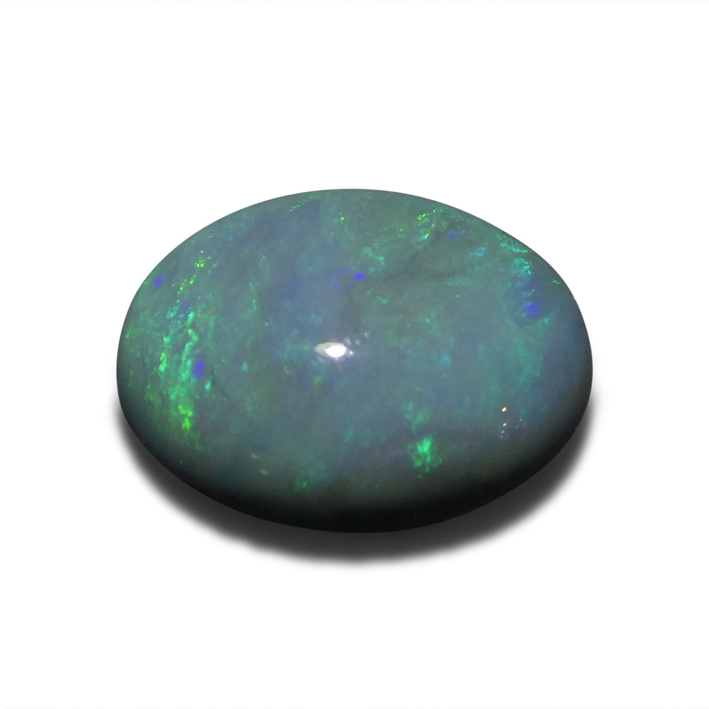 2.37ct Australian Black Opal with vivid play of color, oval cabochon cut - premium gemstone from SkyJems' curated collection