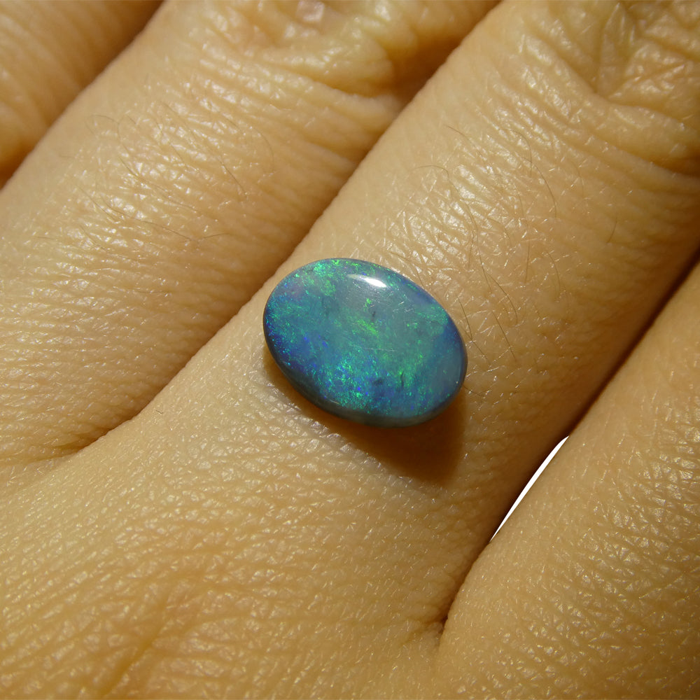 0.93ct Oval Cabochon Black Opal from Australia - Skyjems Wholesale Gemstones