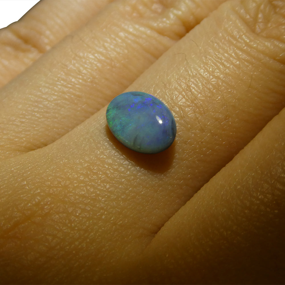 0.9ct Oval Cabochon Black Opal from Australia - Skyjems Wholesale Gemstones