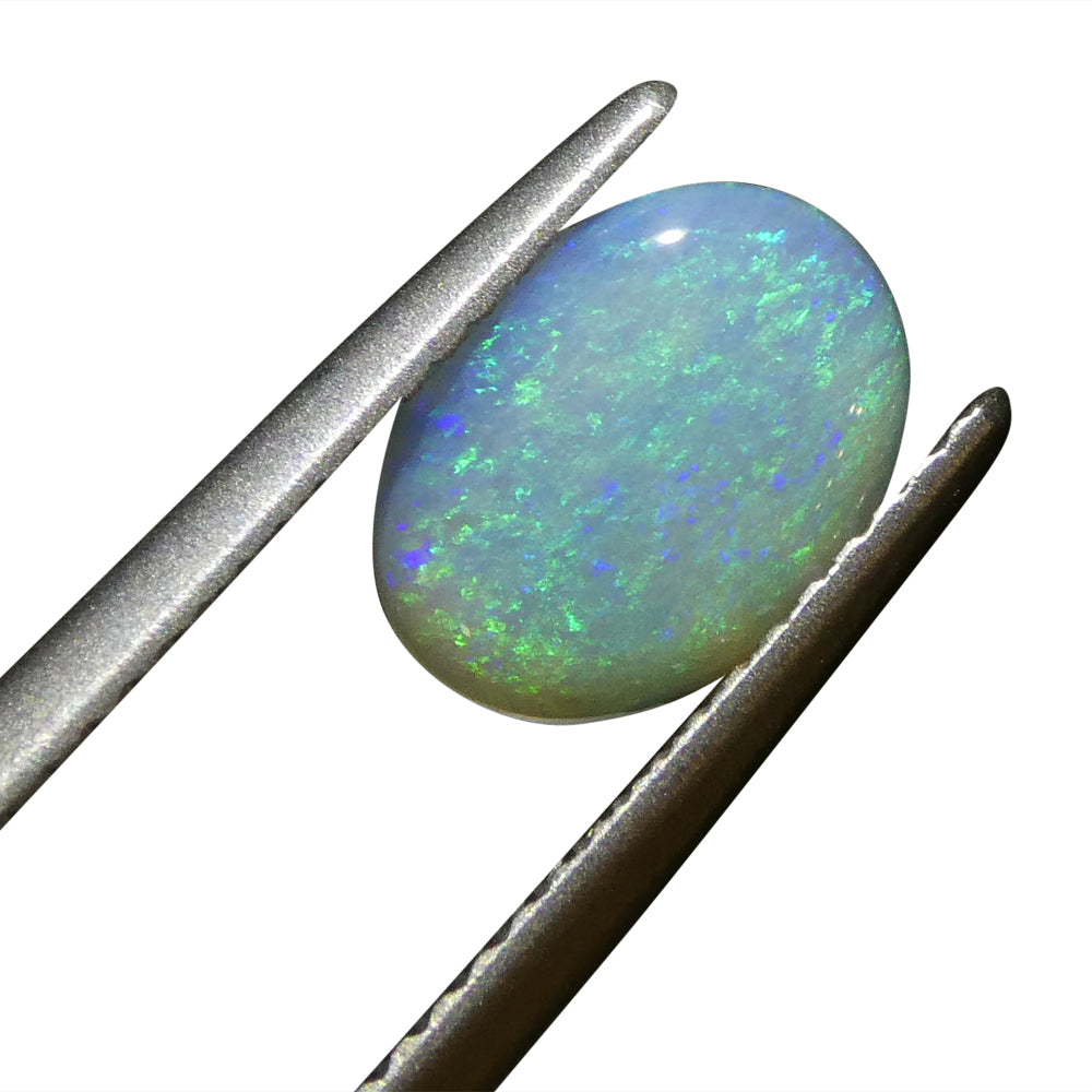 0.93ct Grey Australian Opal Cabochon with Play of Color from SkyJems, premium oval gemstone with green and purple hues