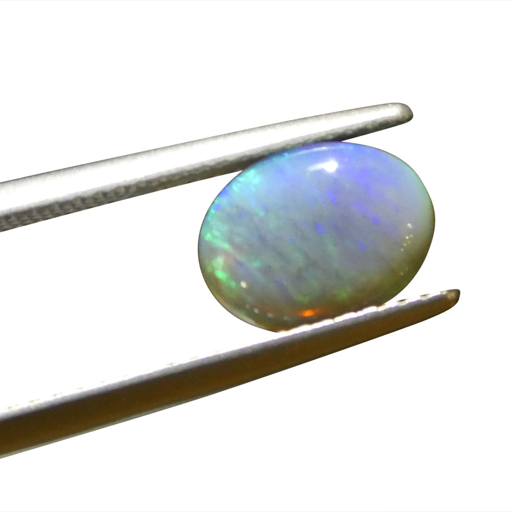 1.32ct Grey Australian Opal Cabochon with Play of Color by SkyJems, premium oval gemstone with green and purple hues