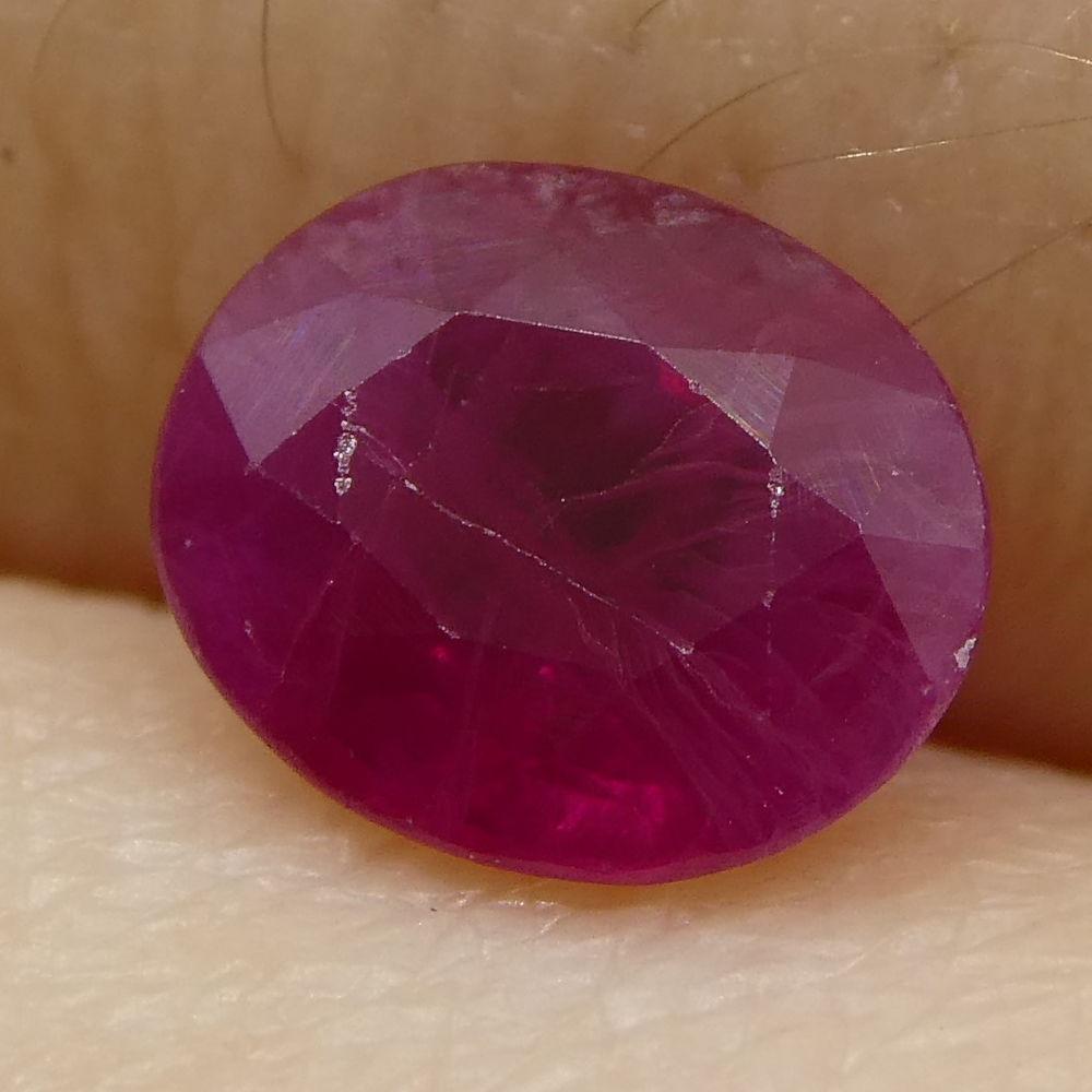 SkyJems 0.75 ct Oval Burma Ruby: vibrant red gemstone, classic Modified Brilliant cut, premium Burmese origin