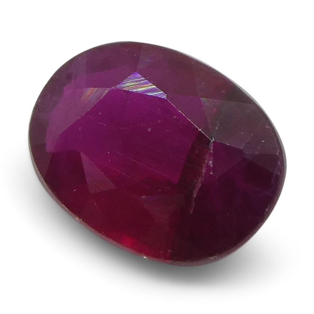 0.71 ct Oval Burma Ruby in vibrant red, precision-cut Modified Brilliant style by SkyJems Canadian gemstone experts