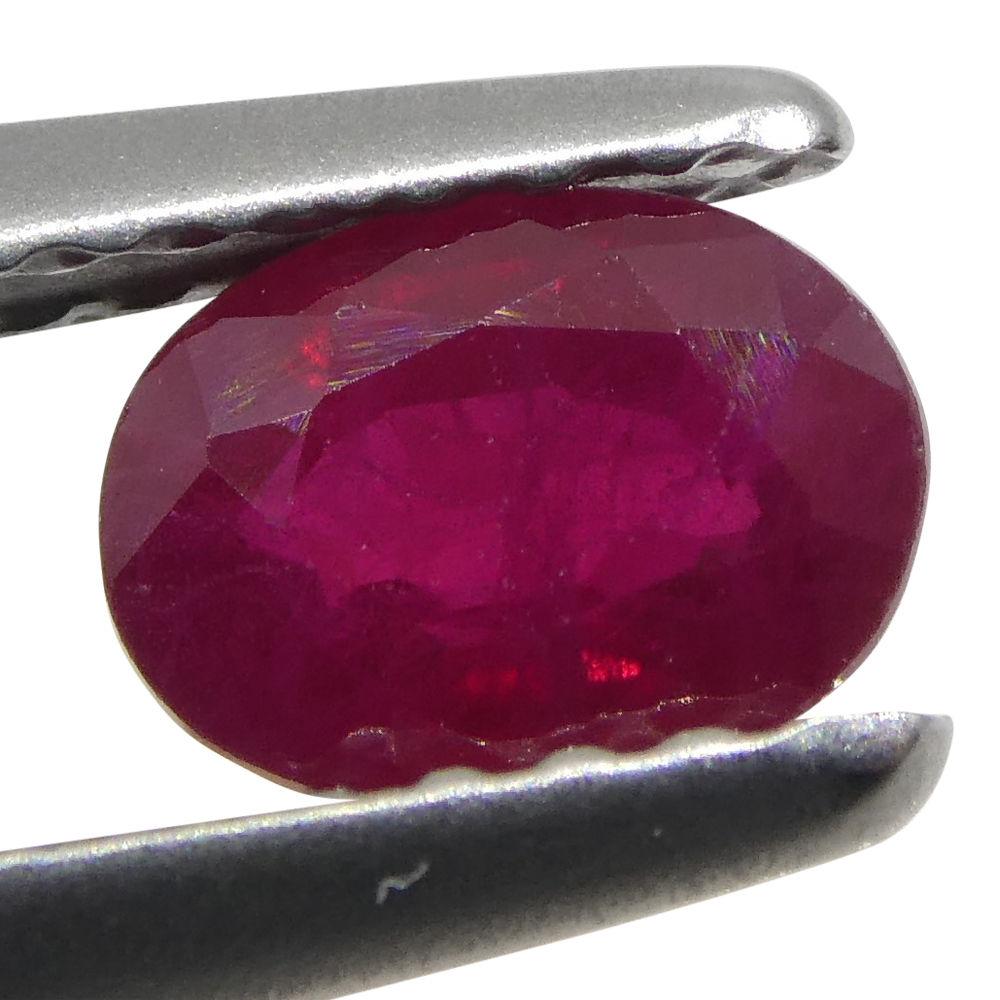 0.75 ct Oval Burma Ruby in vibrant red, precision-cut single stone from SkyJems Canadian gemstone specialists